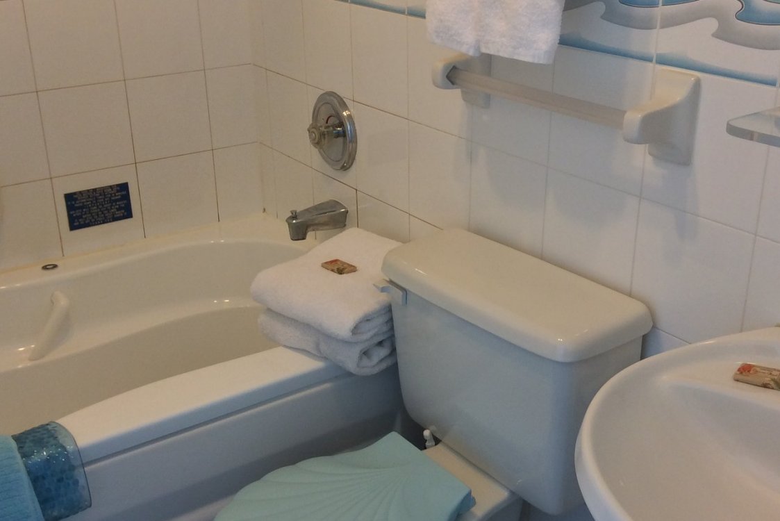 Bathroom includes air-jet whirlpool tub